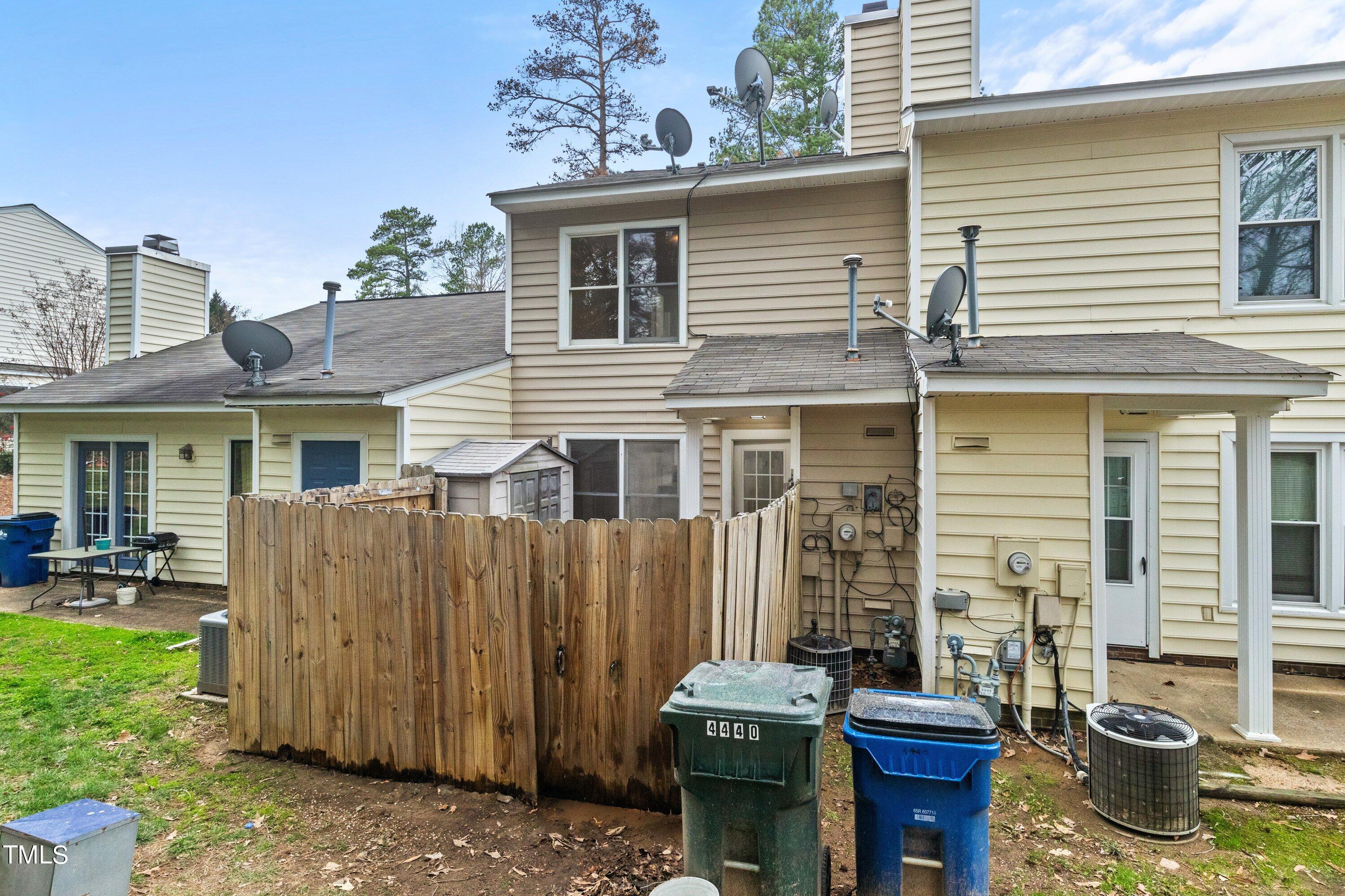 4440 Roller Court Raleigh, NC 27604 - Photo 38 of 38 a view of a house with a chairs in patio