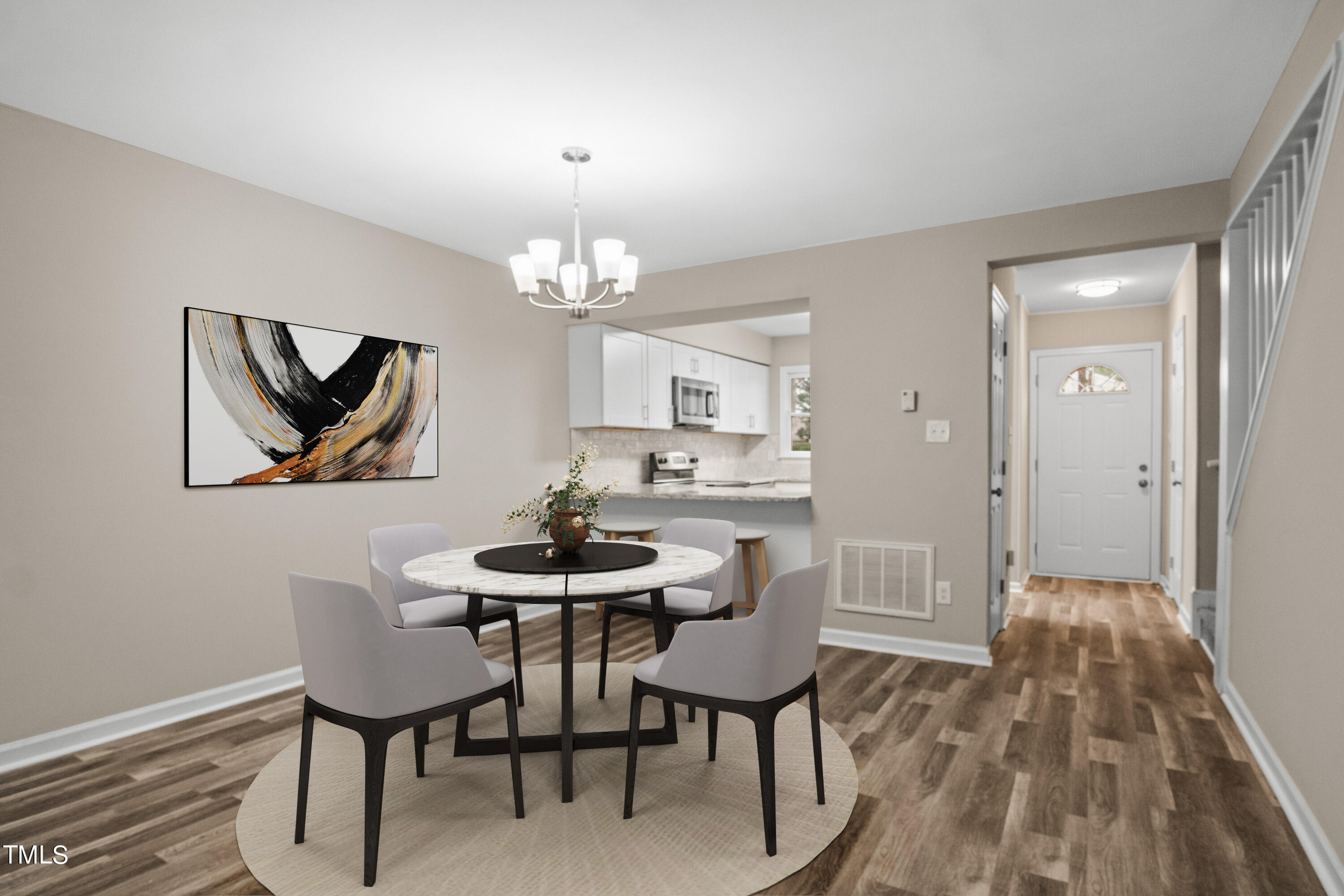 4440 Roller Court Raleigh, NC 27604 - Photo 6 of 38 a view of a dining room with furniture and wooden floor