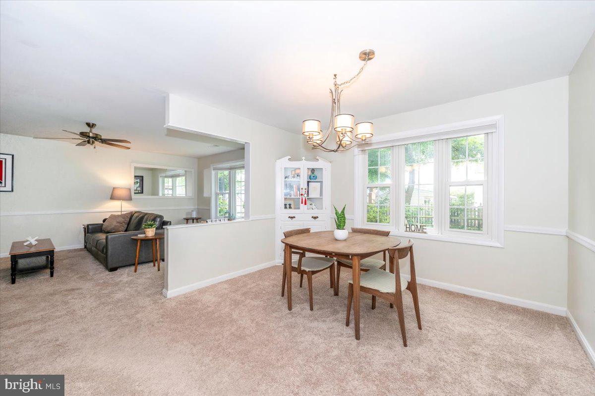 17305 Fletchall Road Poolesville, MD 20837 - Photo 13 of 51 a view of a dining room with furniture window and outside view