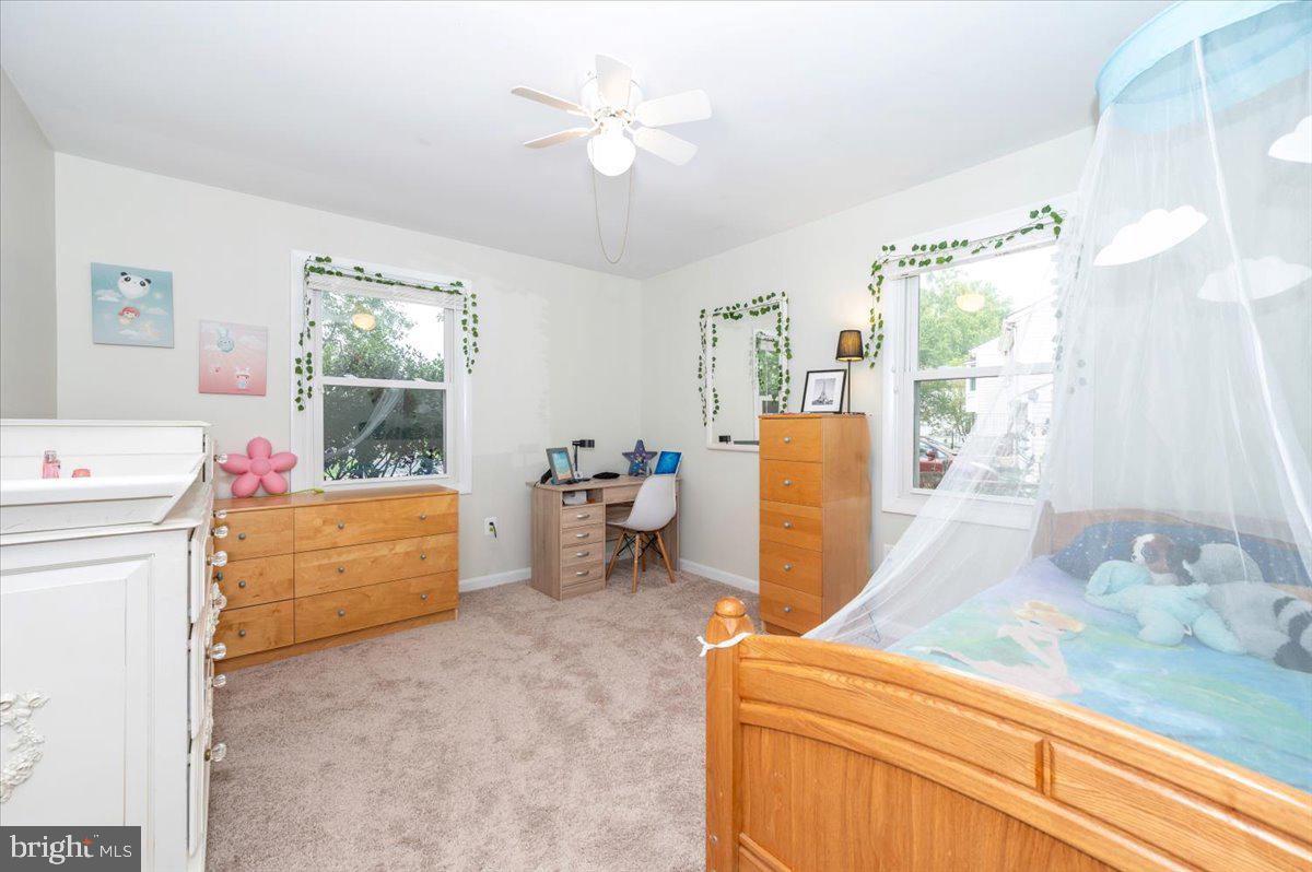 17305 Fletchall Road Poolesville, MD 20837 - Photo 24 of 51 a room with furniture and a table
