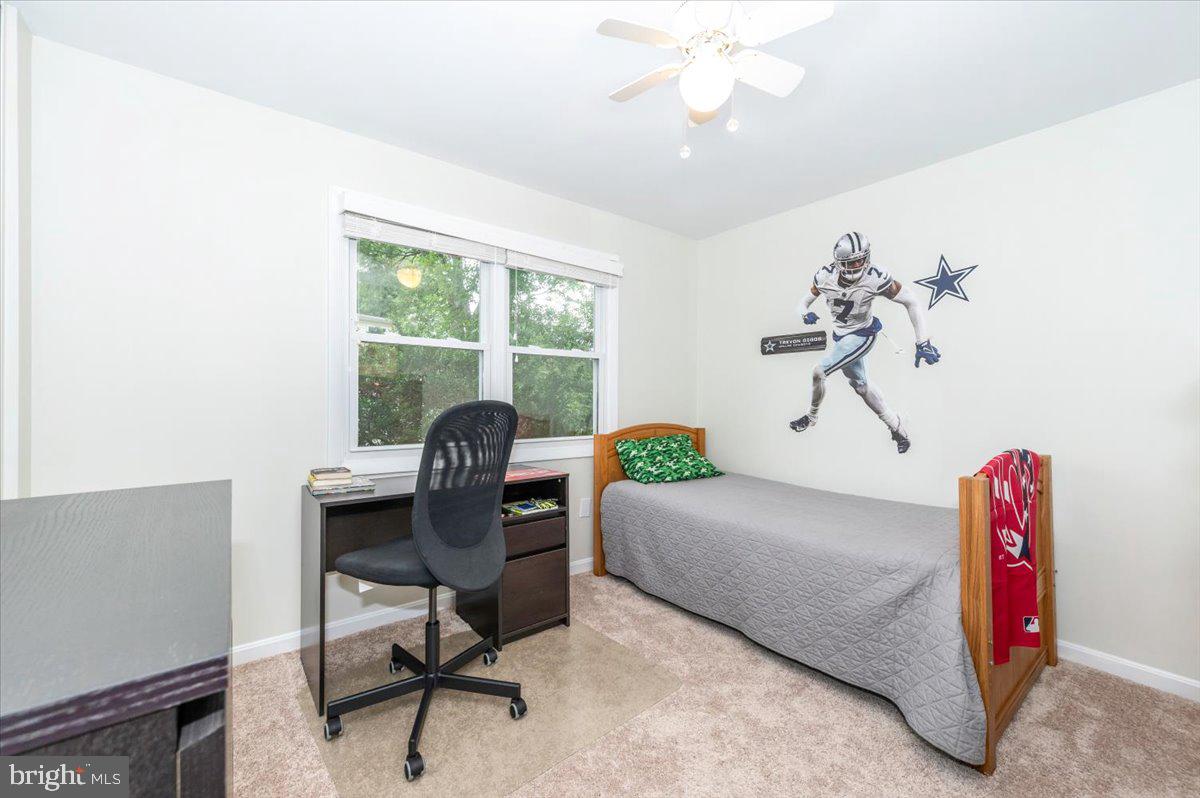 17305 Fletchall Road Poolesville, MD 20837 - Photo 26 of 51 a living room with furniture and a window