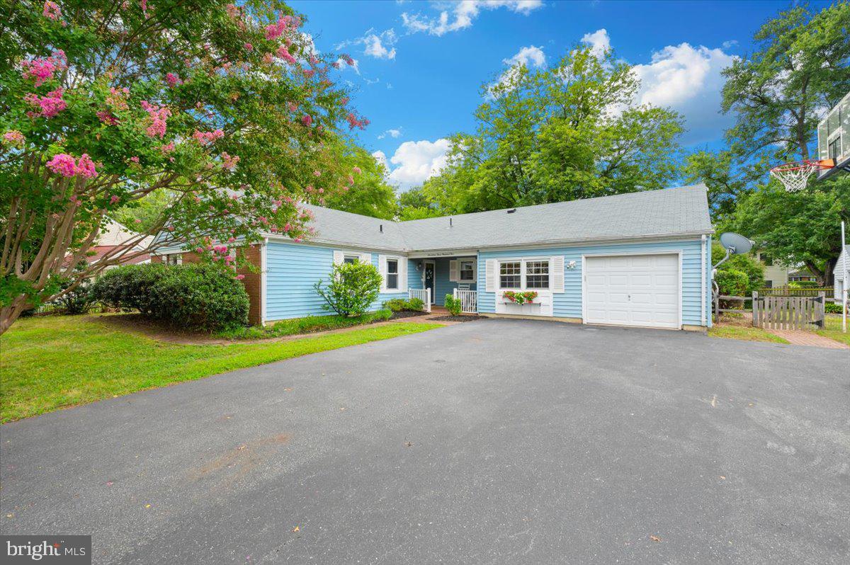 17305 Fletchall Road Poolesville, MD 20837 - Photo 3 of 51 a view of a house with a yard and garage