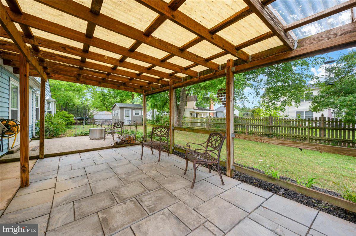 17305 Fletchall Road Poolesville, MD 20837 - Photo 35 of 51 a view of a porch with furniture and garden
