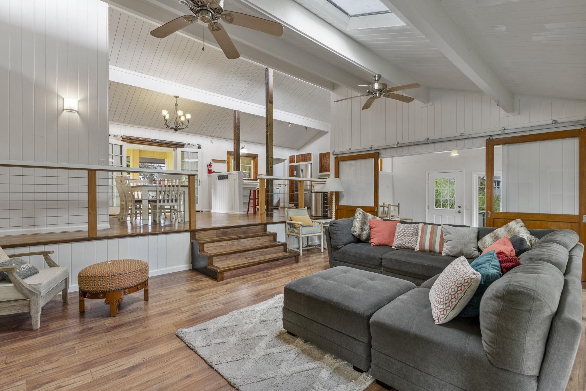 1515 Kaupakalua Road Haiku, HI 96708 - Photo 2 of 45 a living room with furniture and wooden floor