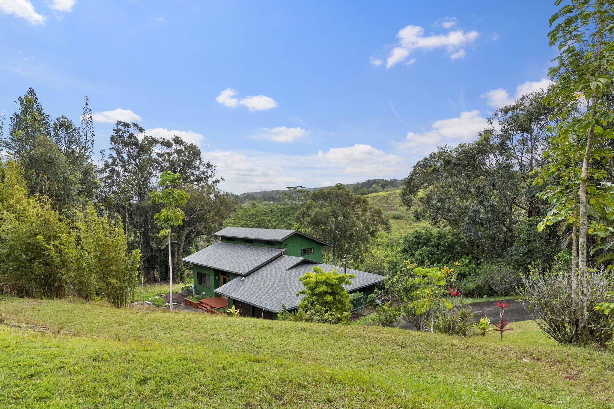 1515 Kaupakalua Road Haiku, HI 96708 - Photo 34 of 45 a view of a house with a backyard