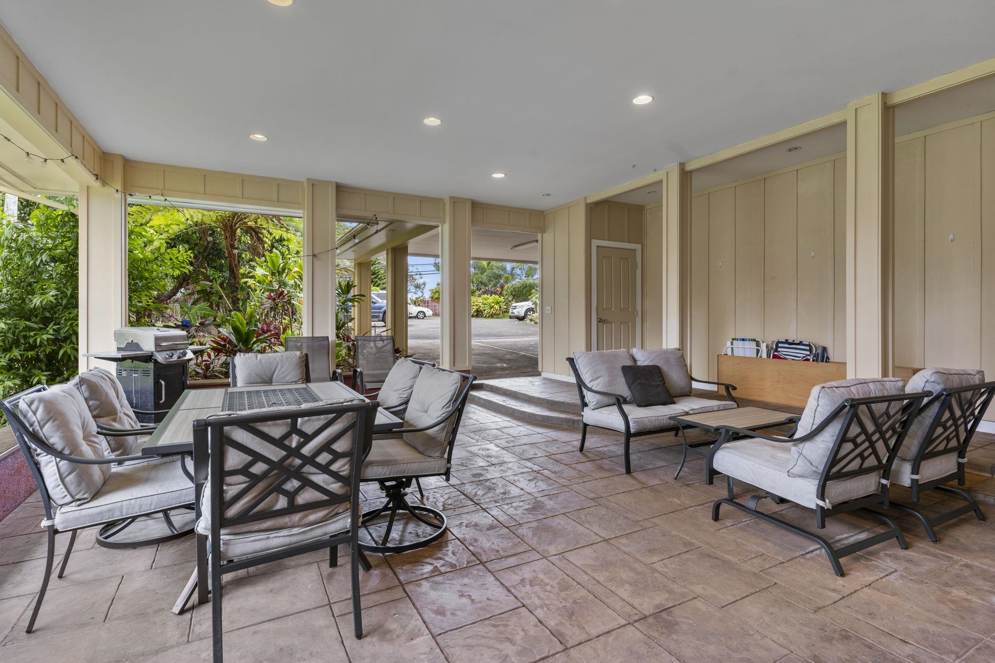 1515 Kaupakalua Road Haiku, HI 96708 - Photo 10 of 45 a living room with furniture and a large window