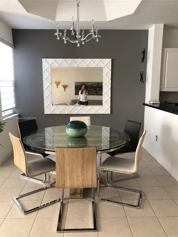 a workspace with furniture and window