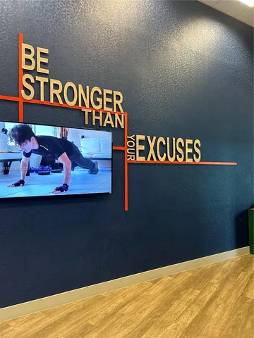 a room with gym equipment and a large window