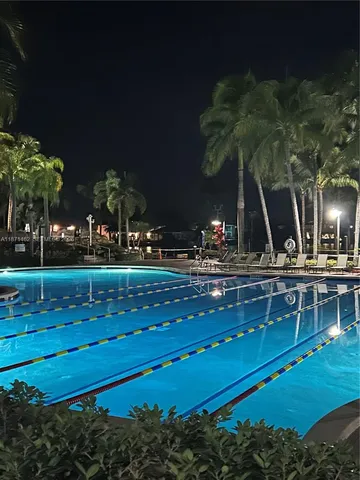 a sign broad on a brick wall