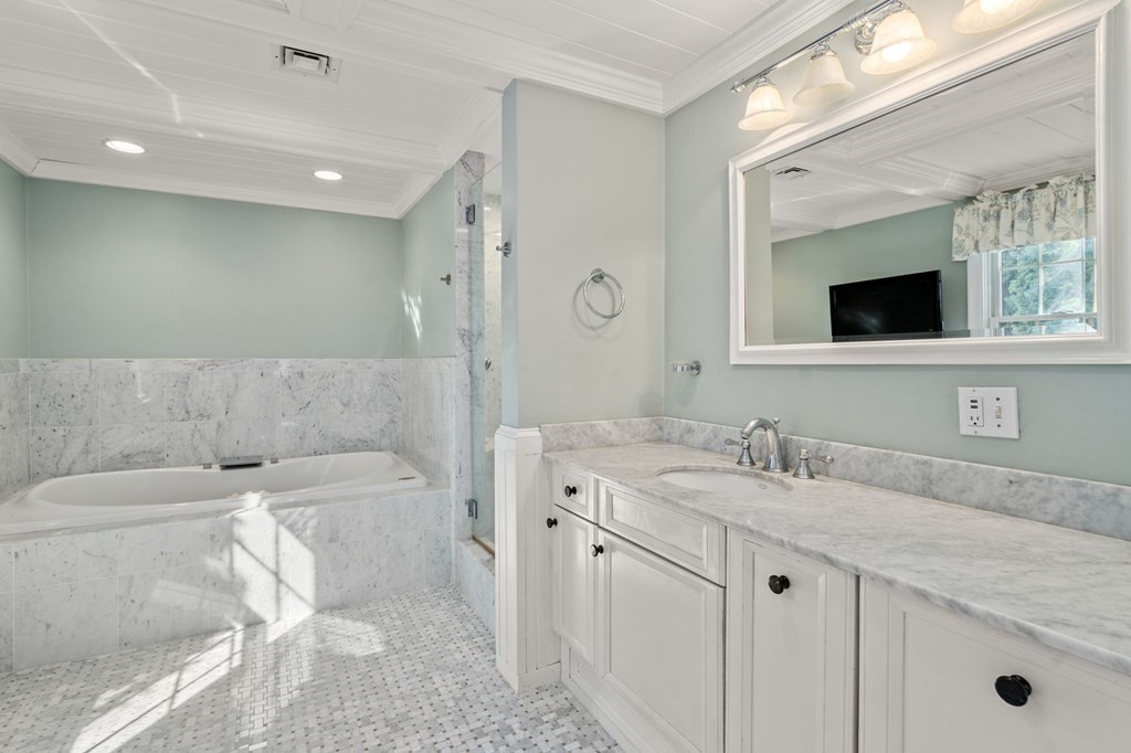59 Standish Road Wellesley, MA 02481 - Photo 14 of 31 a bathroom with a granite countertop sink mirror and a