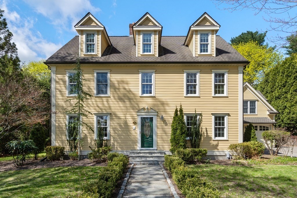 59 Standish Road Wellesley, MA 02481 - Photo 2 of 31 a front view of a house with a yard and trees