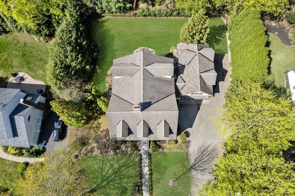 59 Standish Road Wellesley, MA 02481 - Photo 25 of 31 an aerial view of a house with outdoor space and a lake view in back