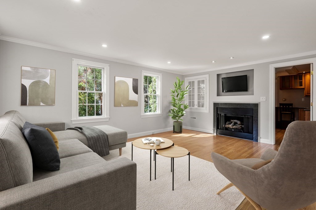 59 Standish Road Wellesley, MA 02481 - Photo 4 of 31 a living room with furniture and a fireplace