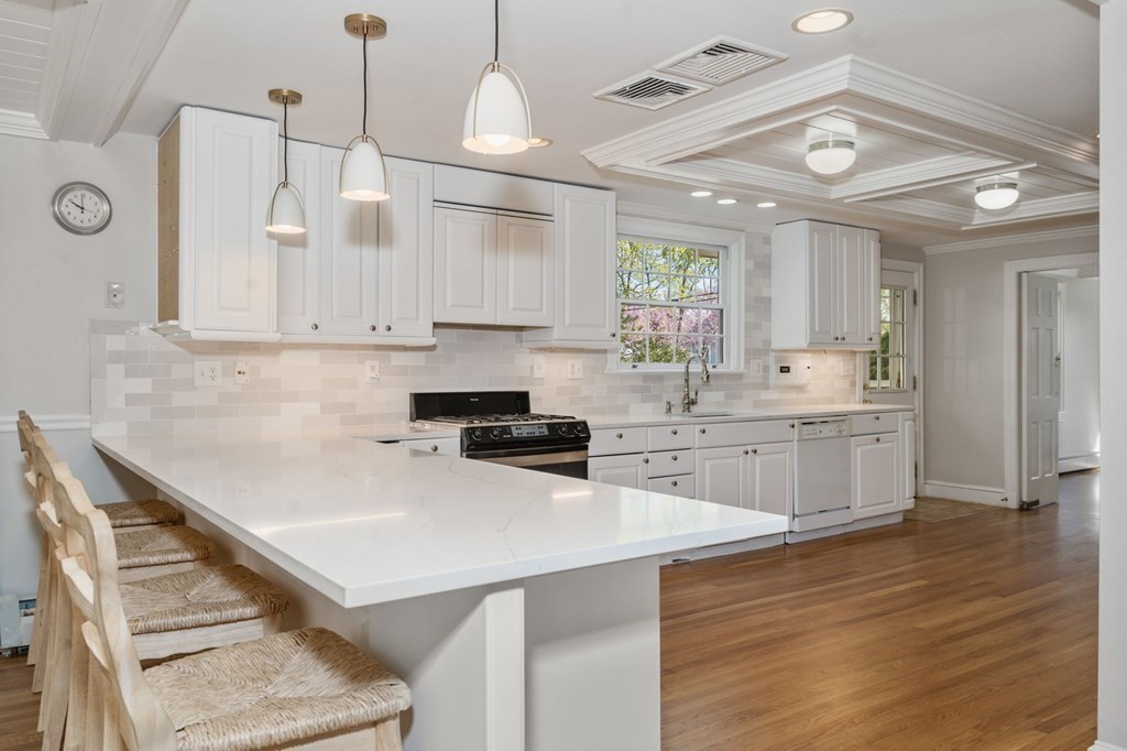 59 Standish Road Wellesley, MA 02481 - Photo 8 of 31 a kitchen with cabinets a sink and appliances