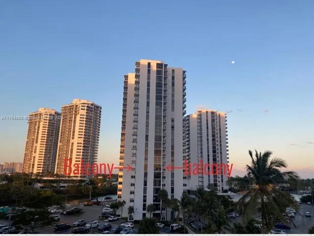 a view of a city with tall buildings