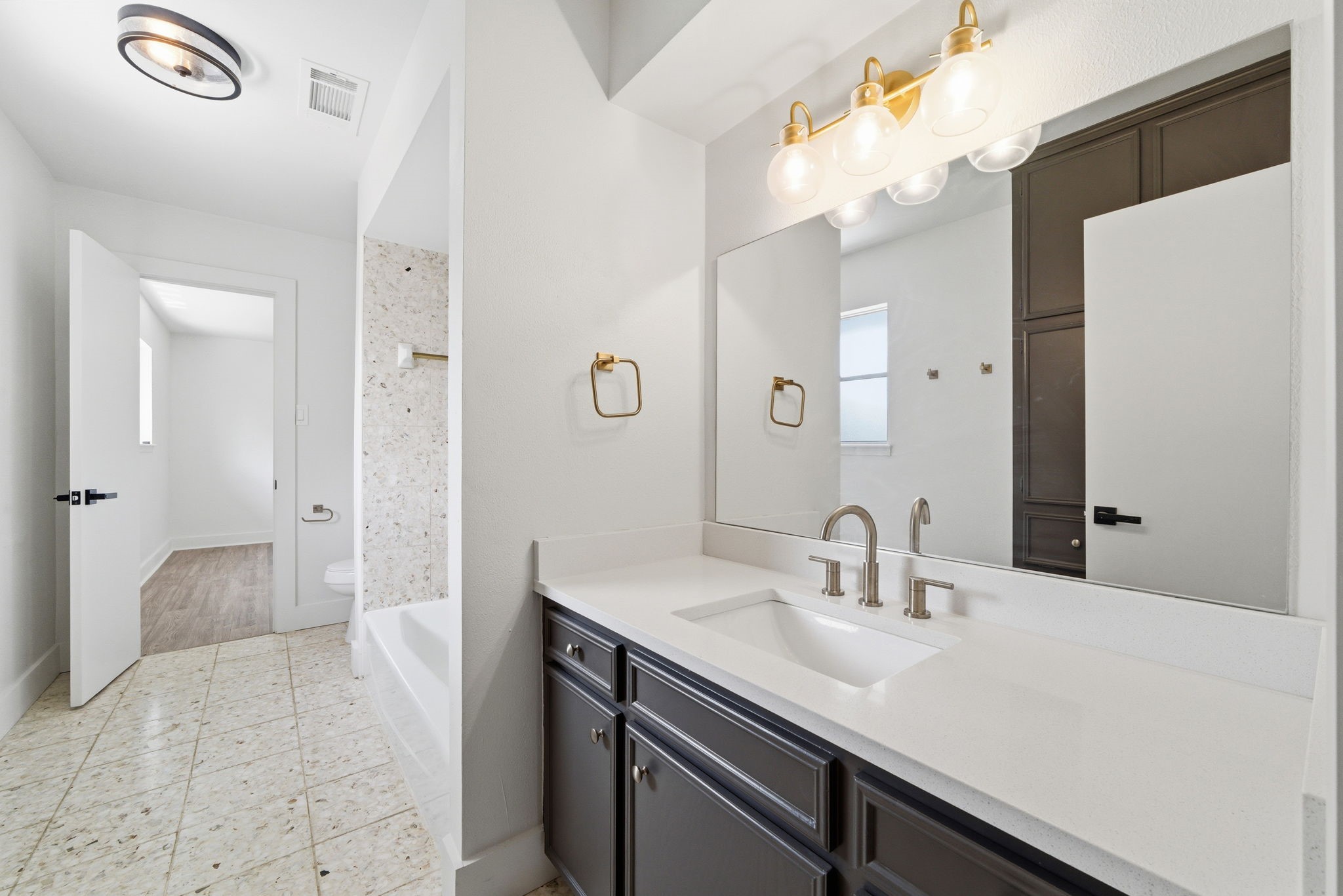 8131 Theisswood Road Spring, TX 77379 - Photo 26 of 31 Jack & Jill Bath between the secondary rooms