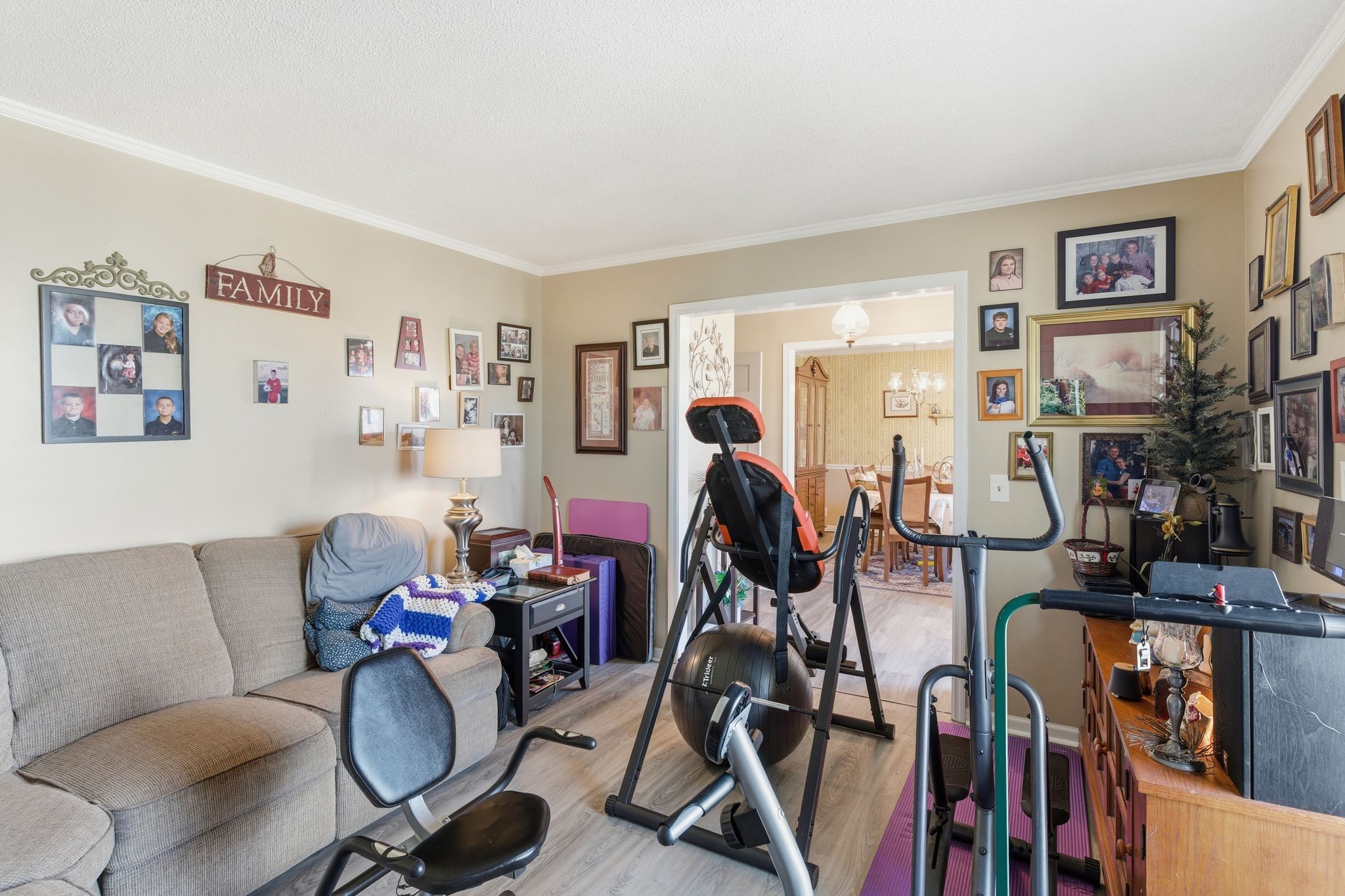8073 Ridgewood Road Goodlettsville, TN 37072 - Photo 13 of 38 a living room with lots of furniture and gym equipment