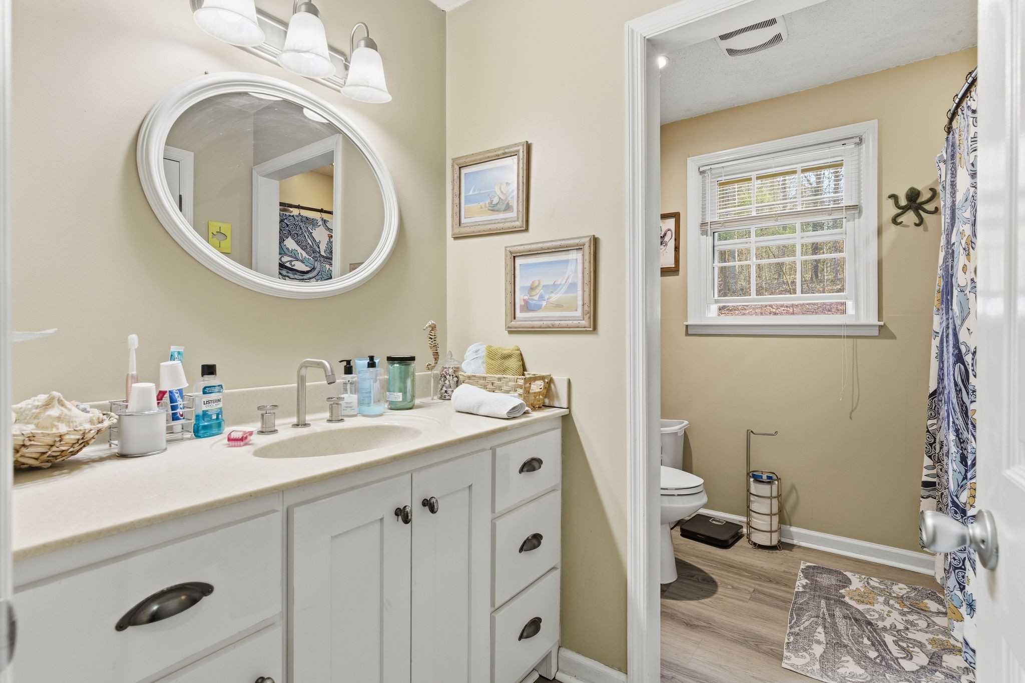 8073 Ridgewood Road Goodlettsville, TN 37072 - Photo 14 of 38 a bathroom with a sink and a mirror