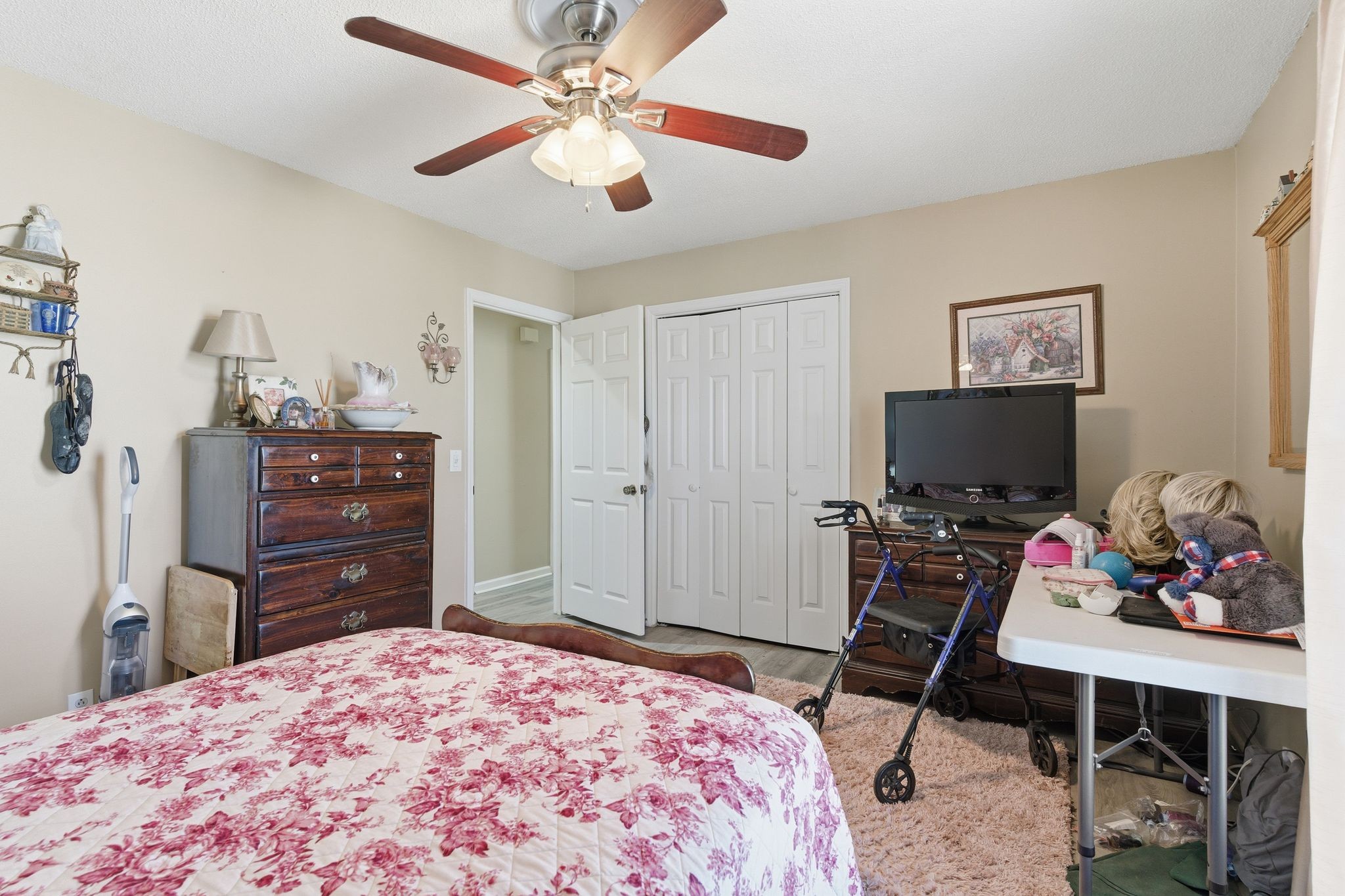 8073 Ridgewood Road Goodlettsville, TN 37072 - Photo 20 of 38 a bedroom with a bed and a flat screen tv