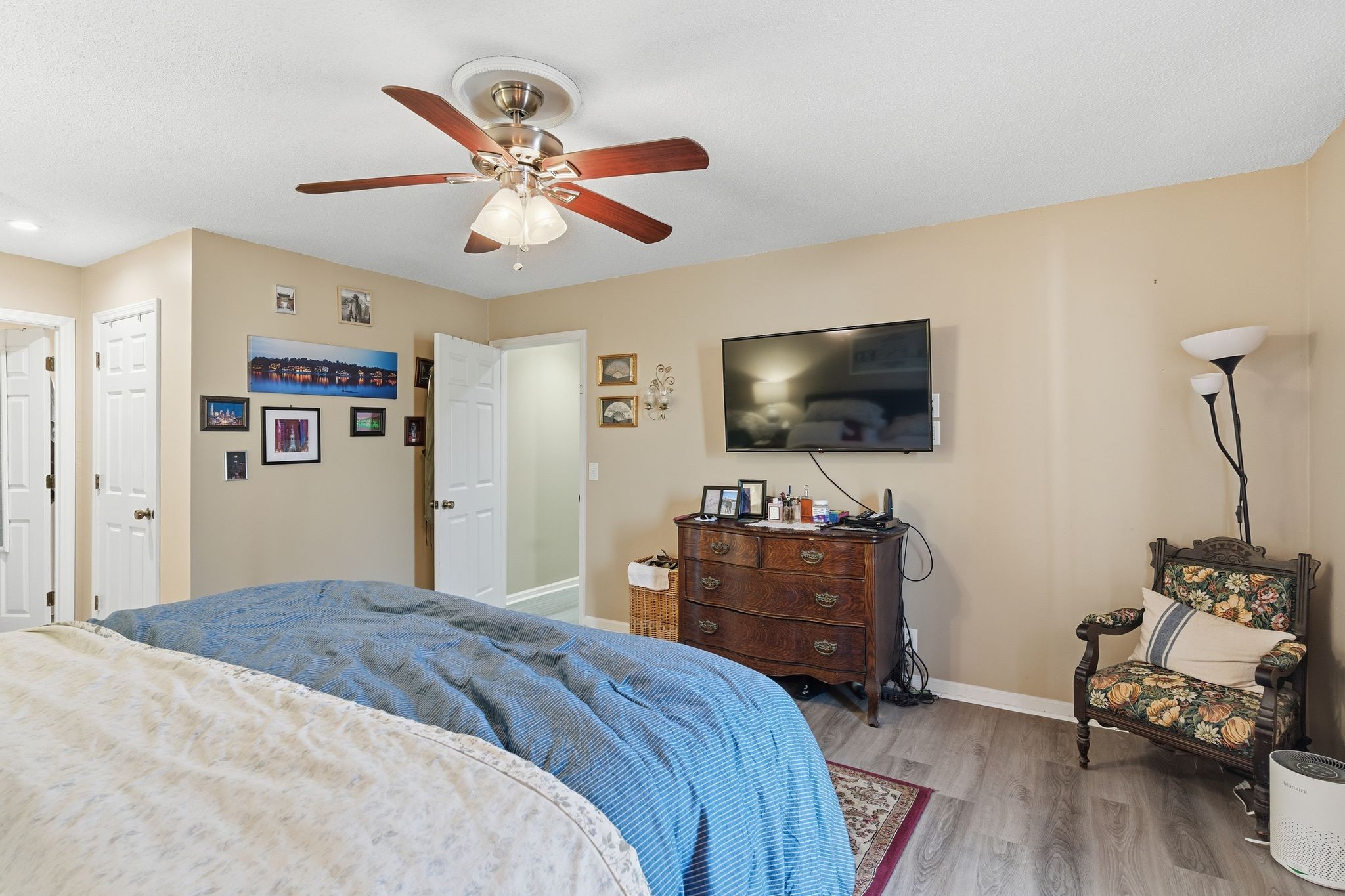 8073 Ridgewood Road Goodlettsville, TN 37072 - Photo 22 of 38 a bedroom with furniture and a flat screen tv