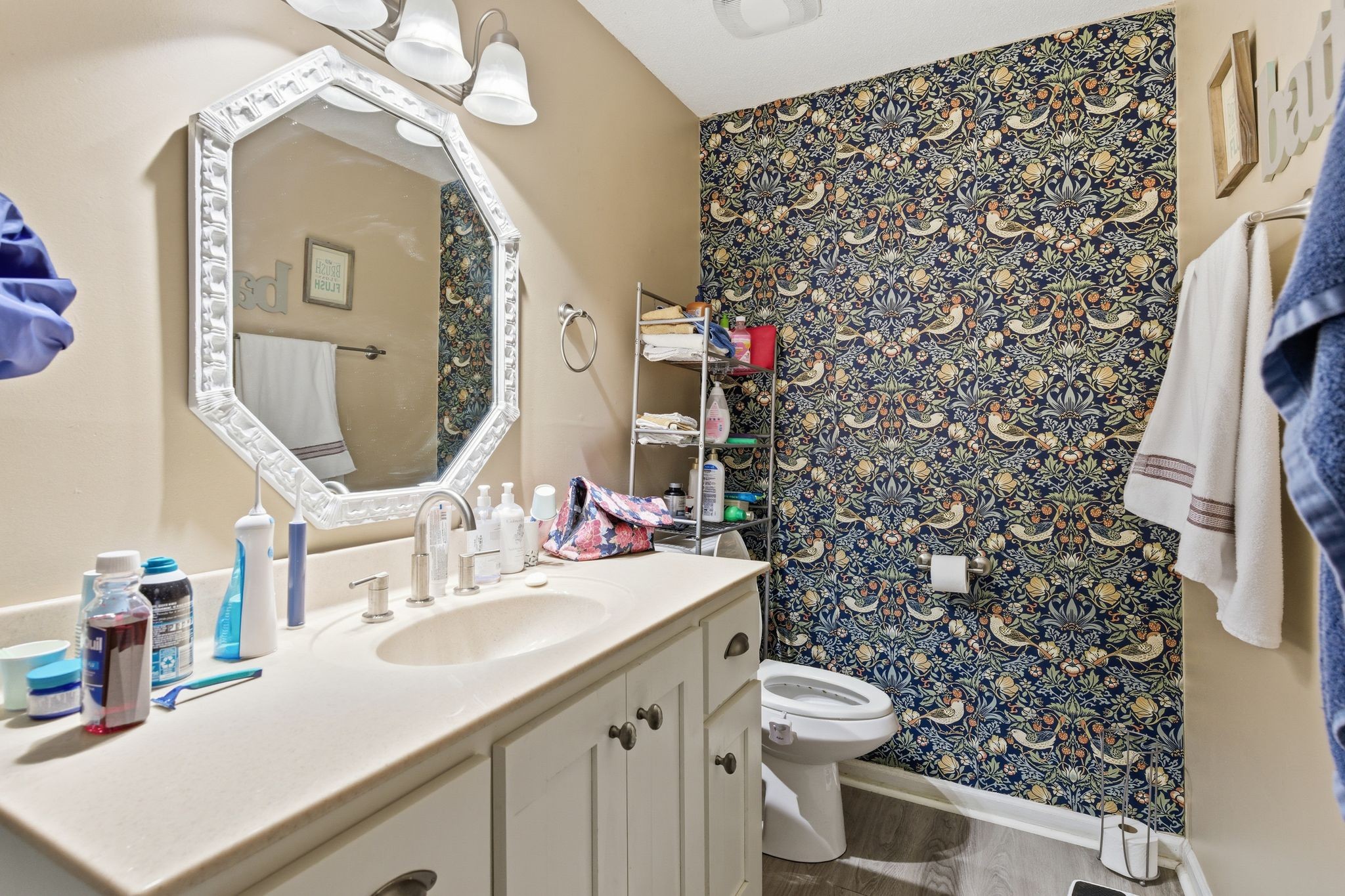 8073 Ridgewood Road Goodlettsville, TN 37072 - Photo 23 of 38 a bathroom with a sink vanity mirror and toilet