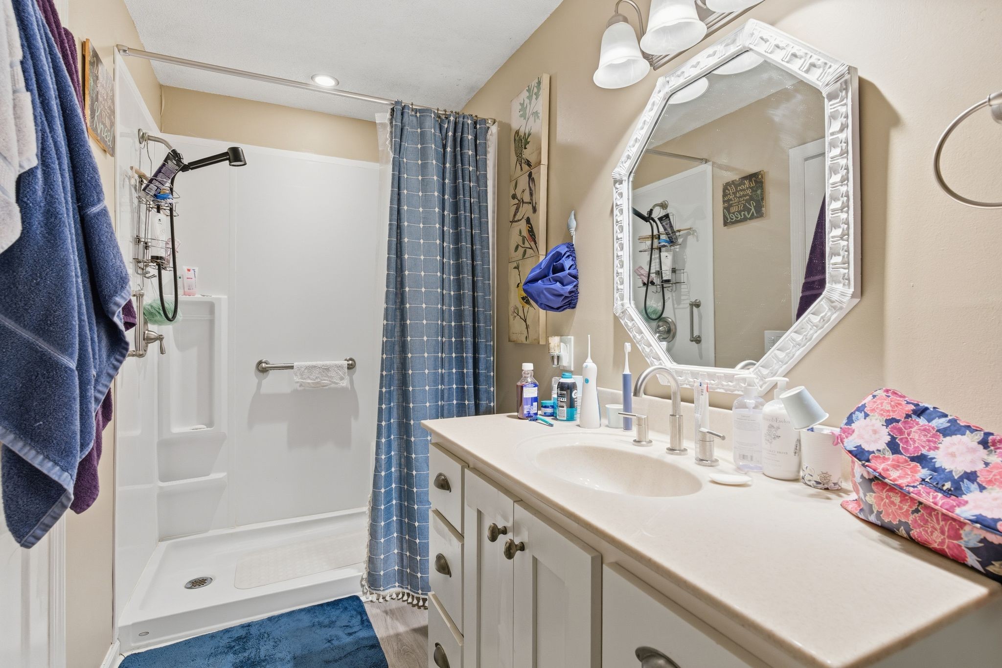 8073 Ridgewood Road Goodlettsville, TN 37072 - Photo 24 of 38 a bathroom with a sink vanity mirror and shower