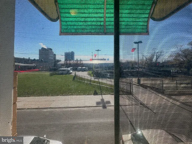 a view of a wooden house with a yard