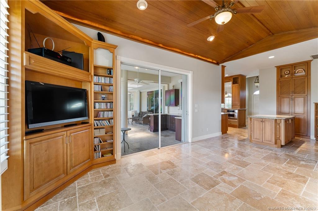 103 Aqua Ra Drive Jensen Beach, FL 34957 - Photo 15 of 48 a view of a livingroom with a flat screen tv