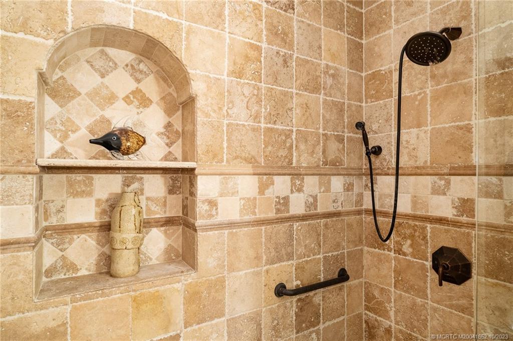 103 Aqua Ra Drive Jensen Beach, FL 34957 - Photo 35 of 48 a bathroom with a shower