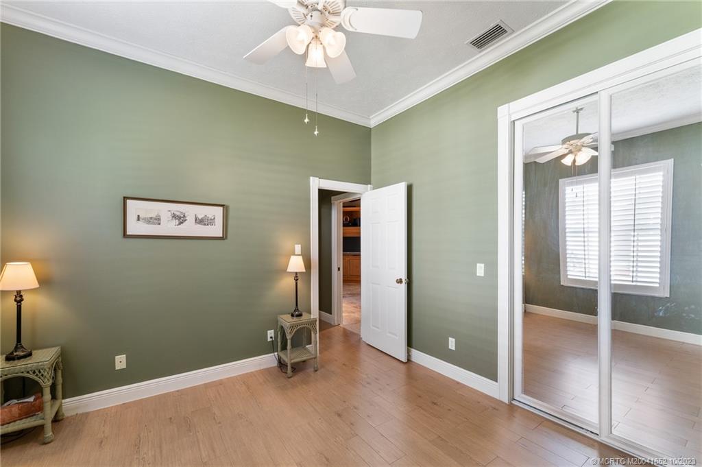 103 Aqua Ra Drive Jensen Beach, FL 34957 - Photo 39 of 48 wooden floor and window in a room