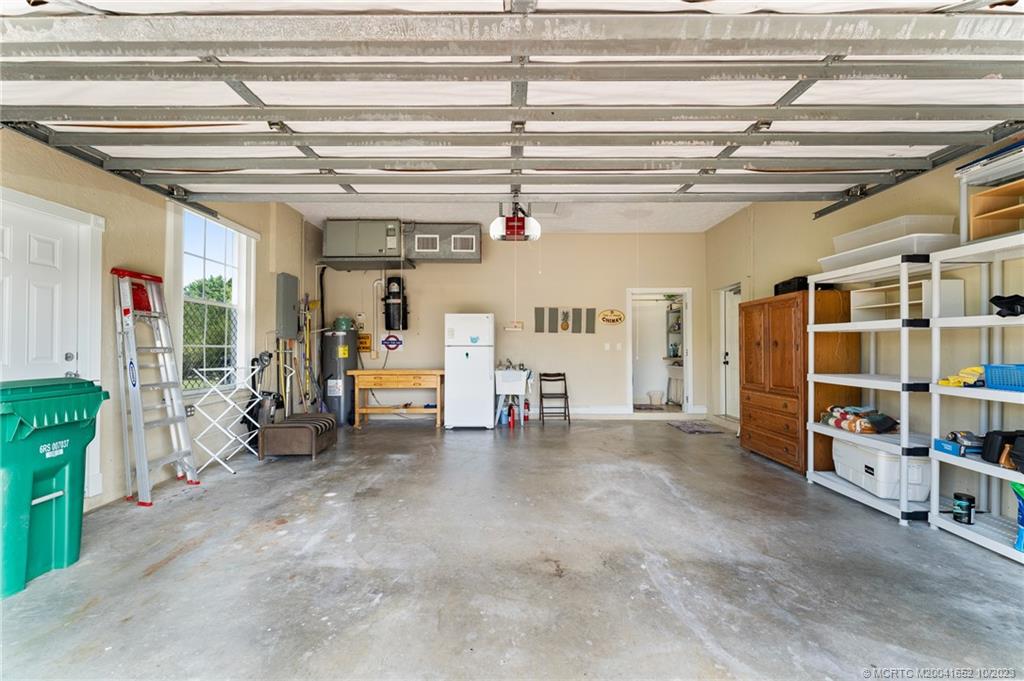 103 Aqua Ra Drive Jensen Beach, FL 34957 - Photo 42 of 48 a view of a room with storage and utility room