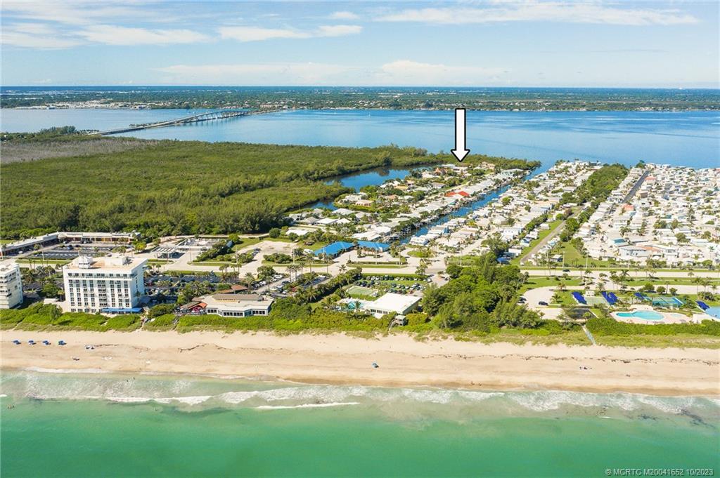 103 Aqua Ra Drive Jensen Beach, FL 34957 - Photo 48 of 48 a view of an ocean beach