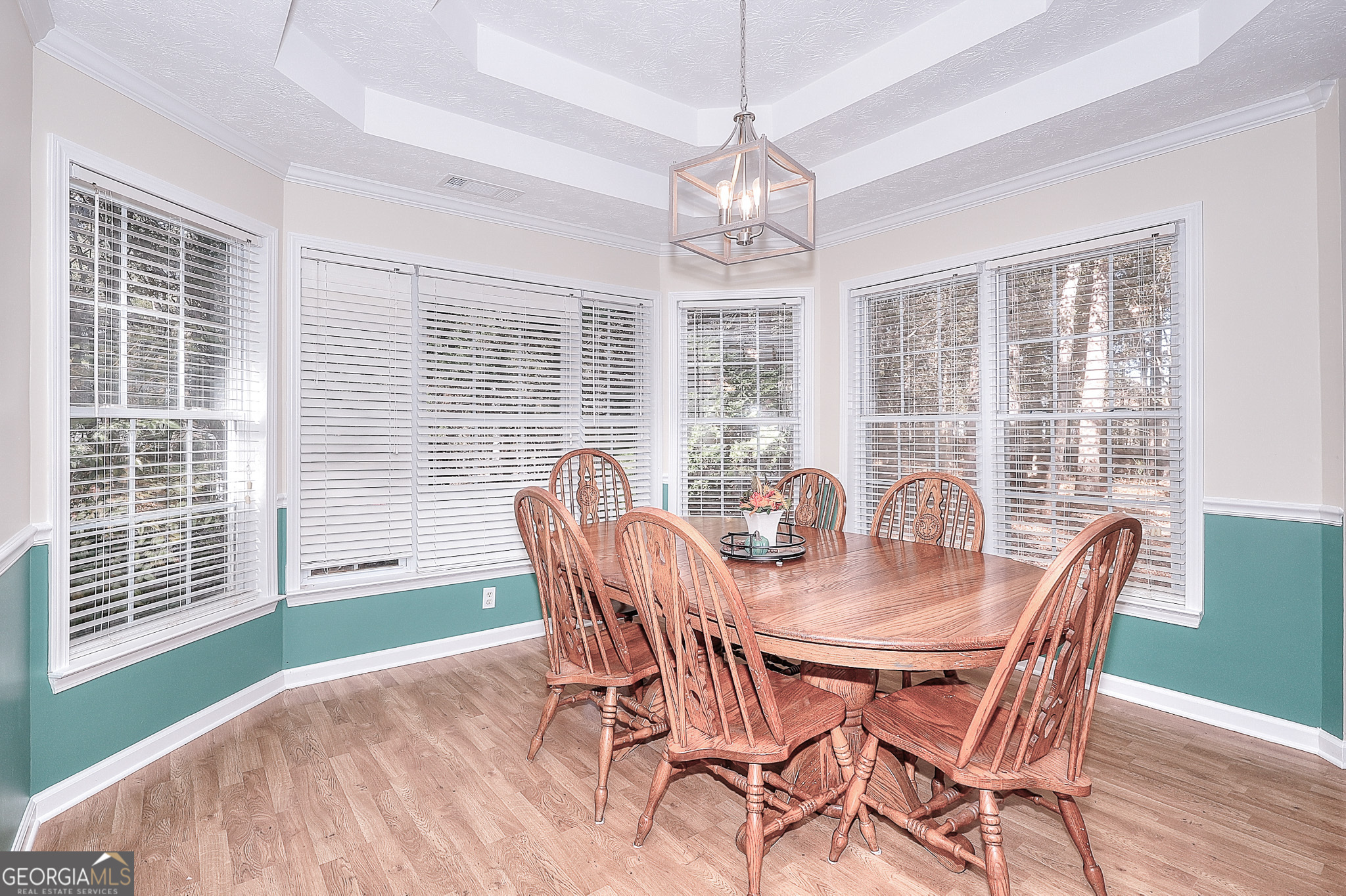 245 Tamea Trail Covington, GA 30014 - Photo 11 of 31 a view of a dining room with furniture window and outside view