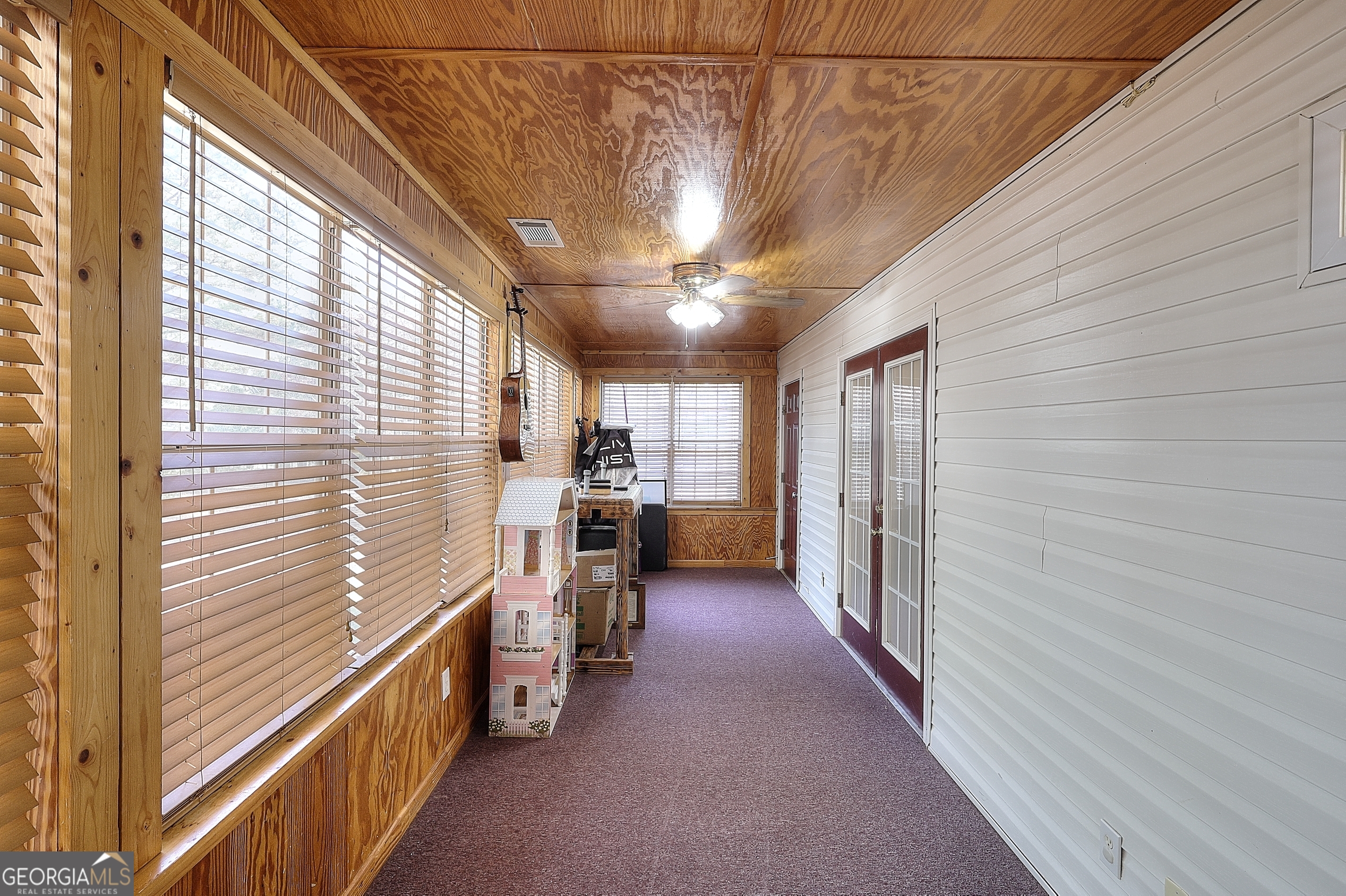 245 Tamea Trail Covington, GA 30014 - Photo 25 of 31 a view of a hallway with stairs