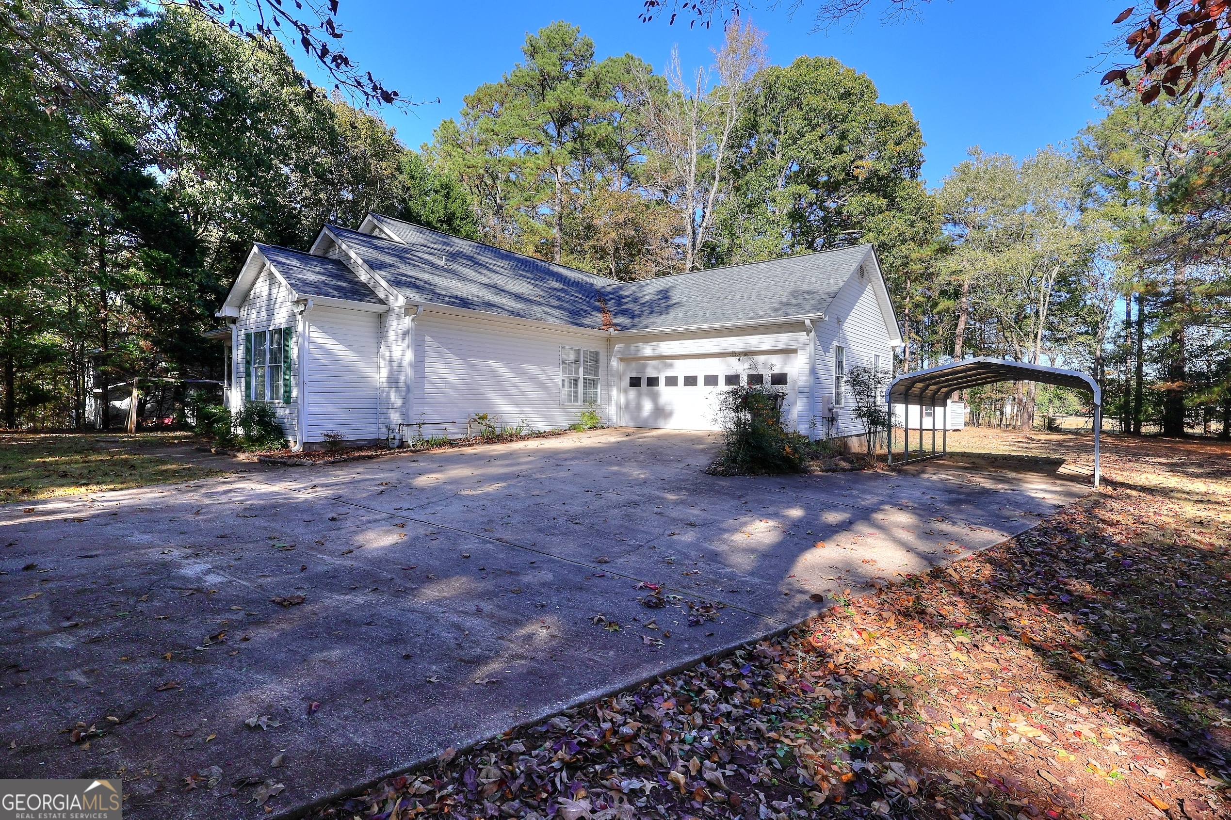 245 Tamea Trail Covington, GA 30014 - Photo 29 of 31 a view of a street with houses