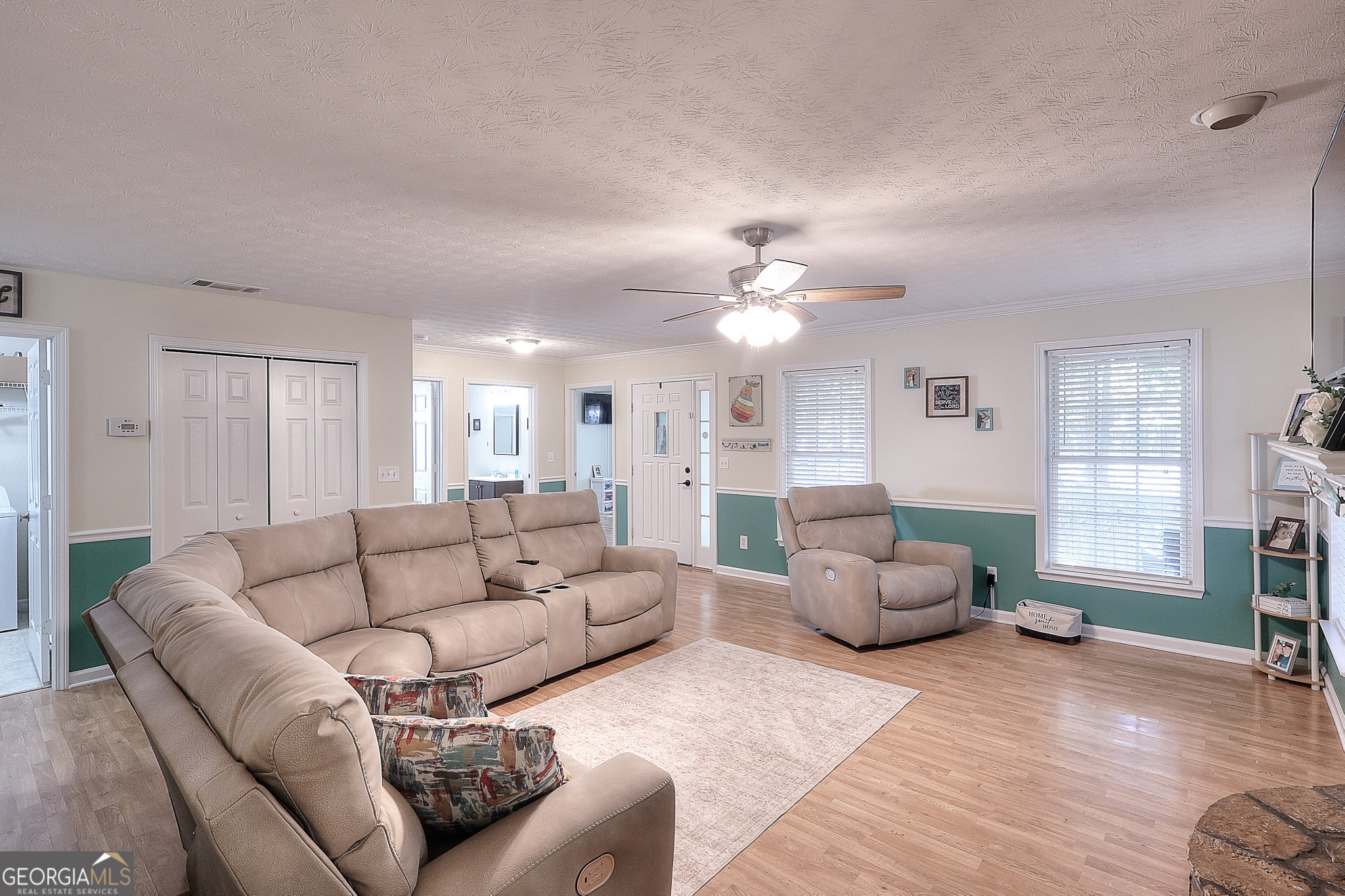 245 Tamea Trail Covington, GA 30014 - Photo 5 of 31 a living room with furniture and wooden floor