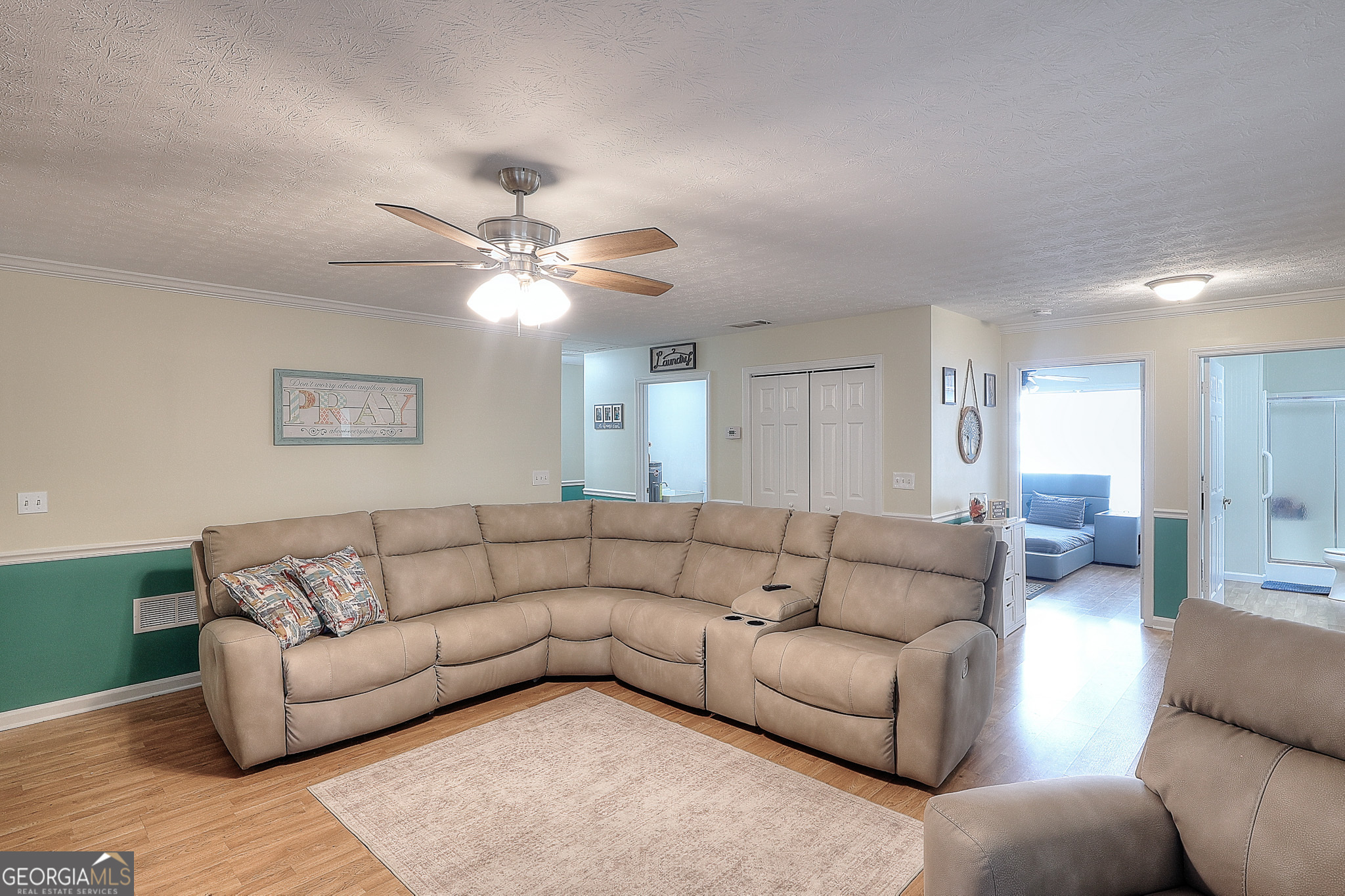 245 Tamea Trail Covington, GA 30014 - Photo 6 of 31 a living room with furniture and white walls