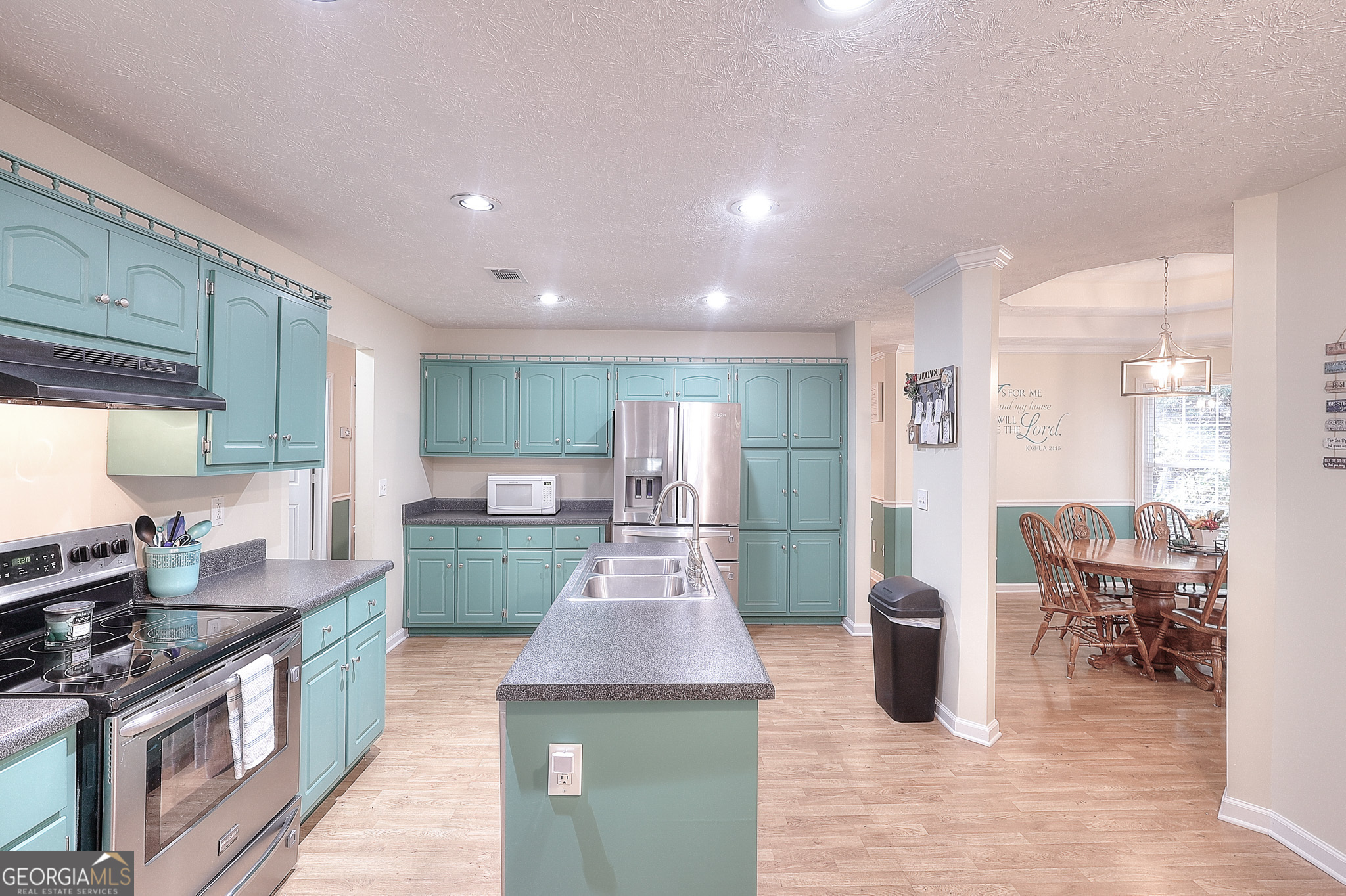 245 Tamea Trail Covington, GA 30014 - Photo 9 of 31 a kitchen with lots of counter top space