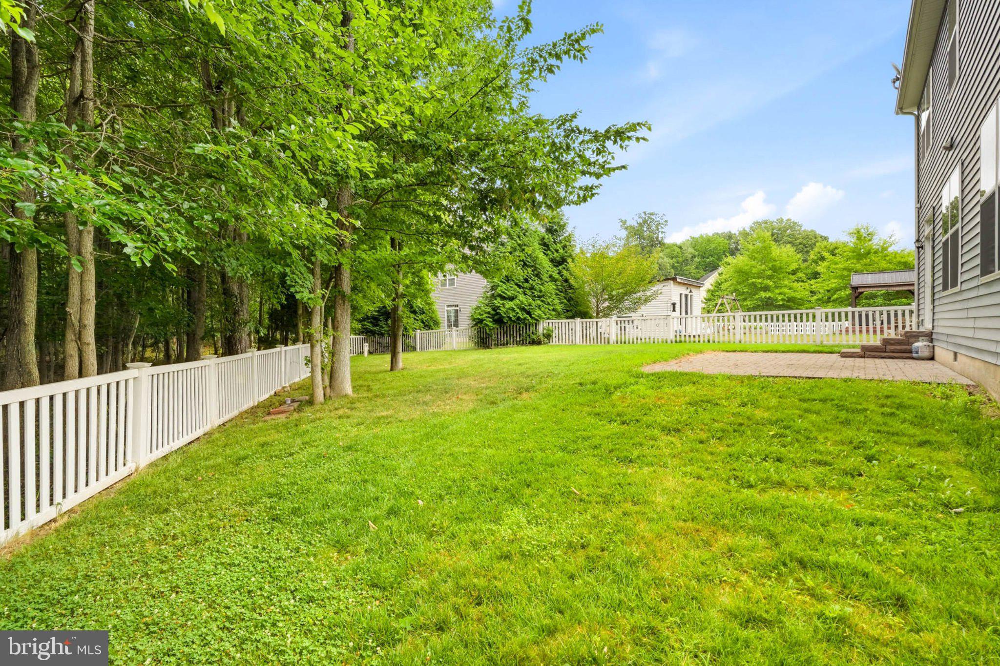 706 Trapper Way Deale, MD 20751 - Photo 48 of 61 Lush green yard with serene surroundings.