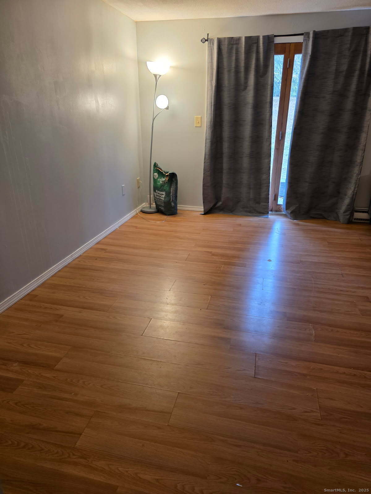 20 Lakeside Drive, Unit P Ledyard, CT 06339 - Photo 16 of 19 a view of a room with wooden floor