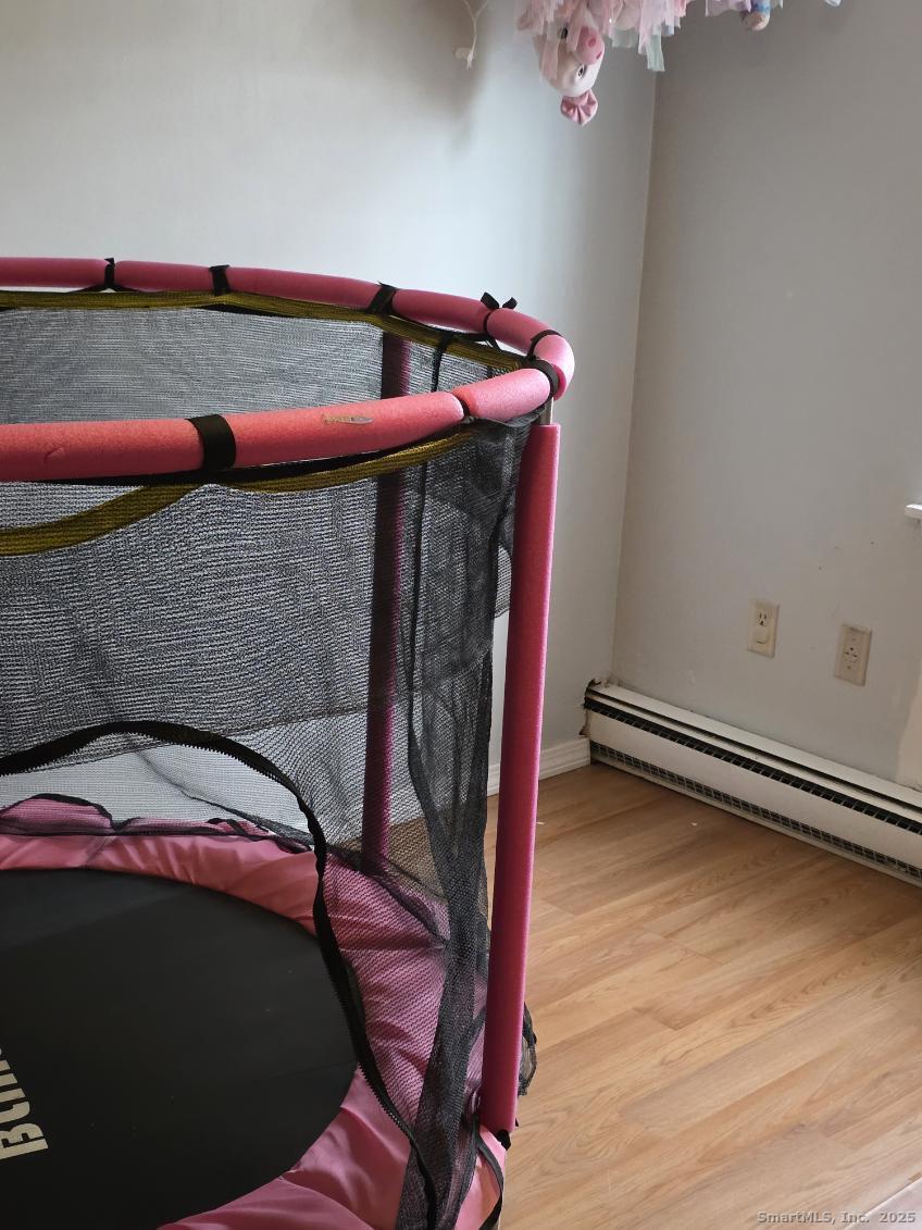 20 Lakeside Drive, Unit P Ledyard, CT 06339 - Photo 8 of 19 a bedroom with a bed and a dresser