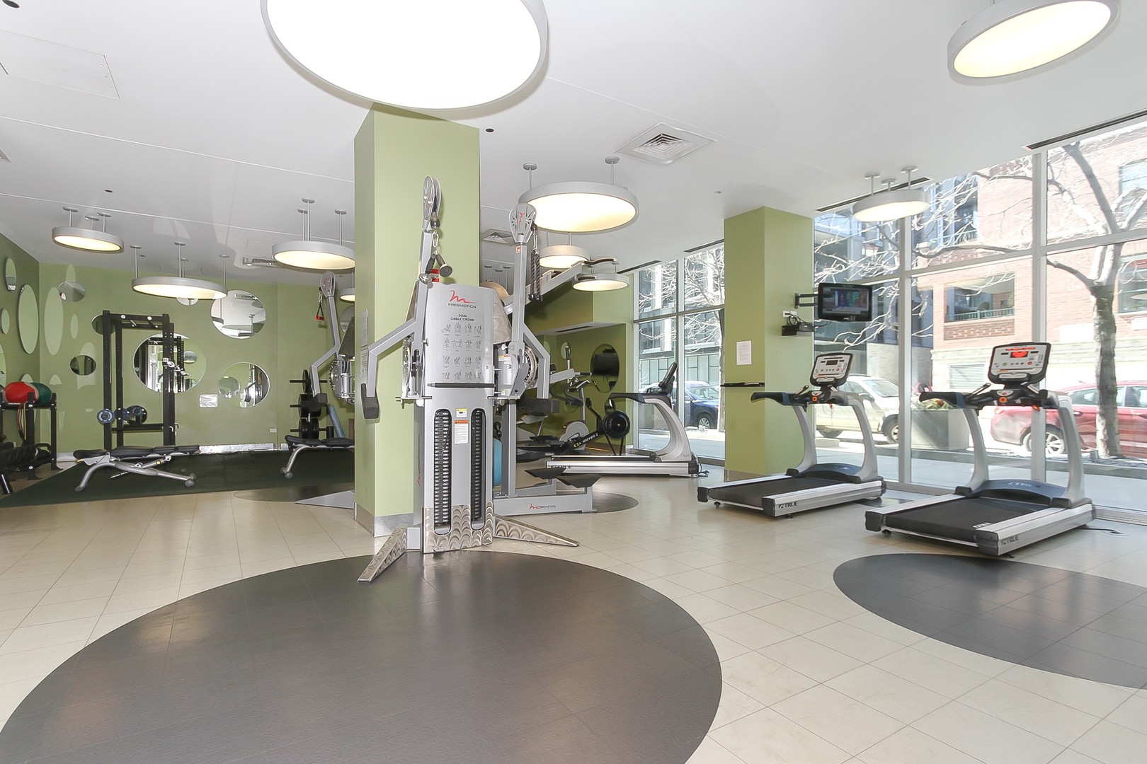 123 South Green Street, Unit 801B Chicago, IL 60607 - Photo 20 of 20 a view of a room with gym equipment
