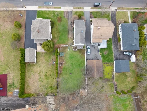 aerial view of a house with outdoor space