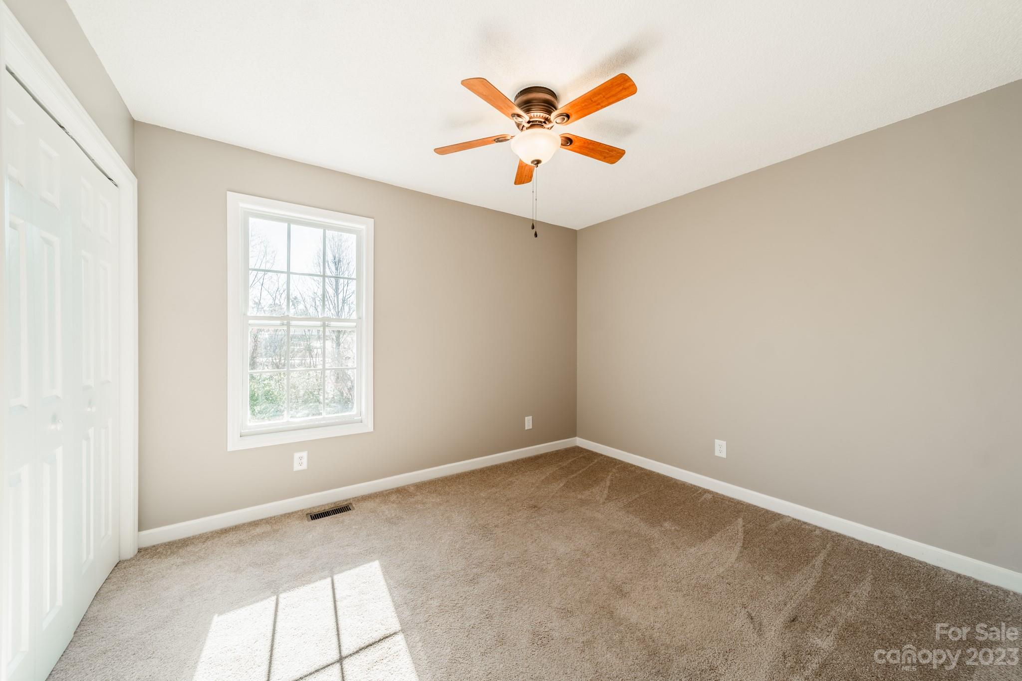 300 Walkers Ridge Drive Shelby, NC 28152 - Photo 9 of 15 an empty room with a window