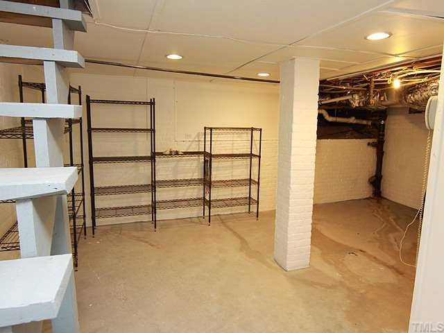 308 Pace Street Raleigh, NC 27604 - Photo 19 of 25 Another view of basement. Stairs come off the center hall. Other