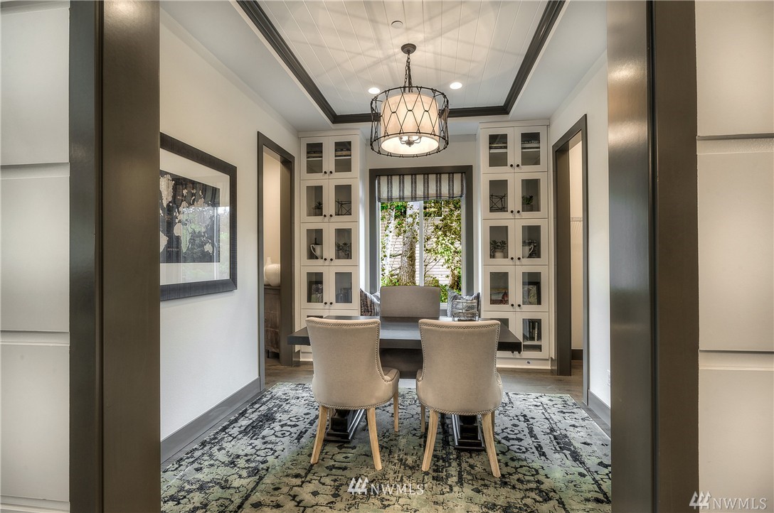 21634 35th Avenue Southeast, Unit 20 Bothell, WA 98021 - Photo 3 of 14 a view of a dining room with furniture large window and chandelier