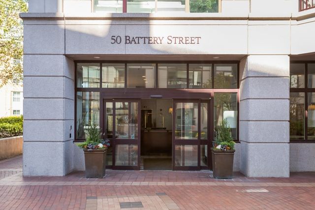 a front view of a building with street view