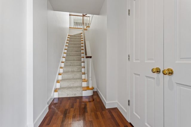 a view of entryway with wooden floor