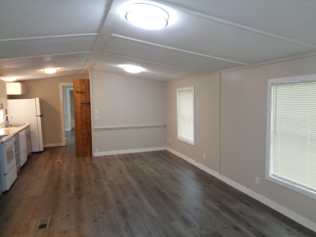 15120 Capitol Hill Road Montgomery, TX 77316 - Photo 8 of 17 a view of a hallway with wooden floor