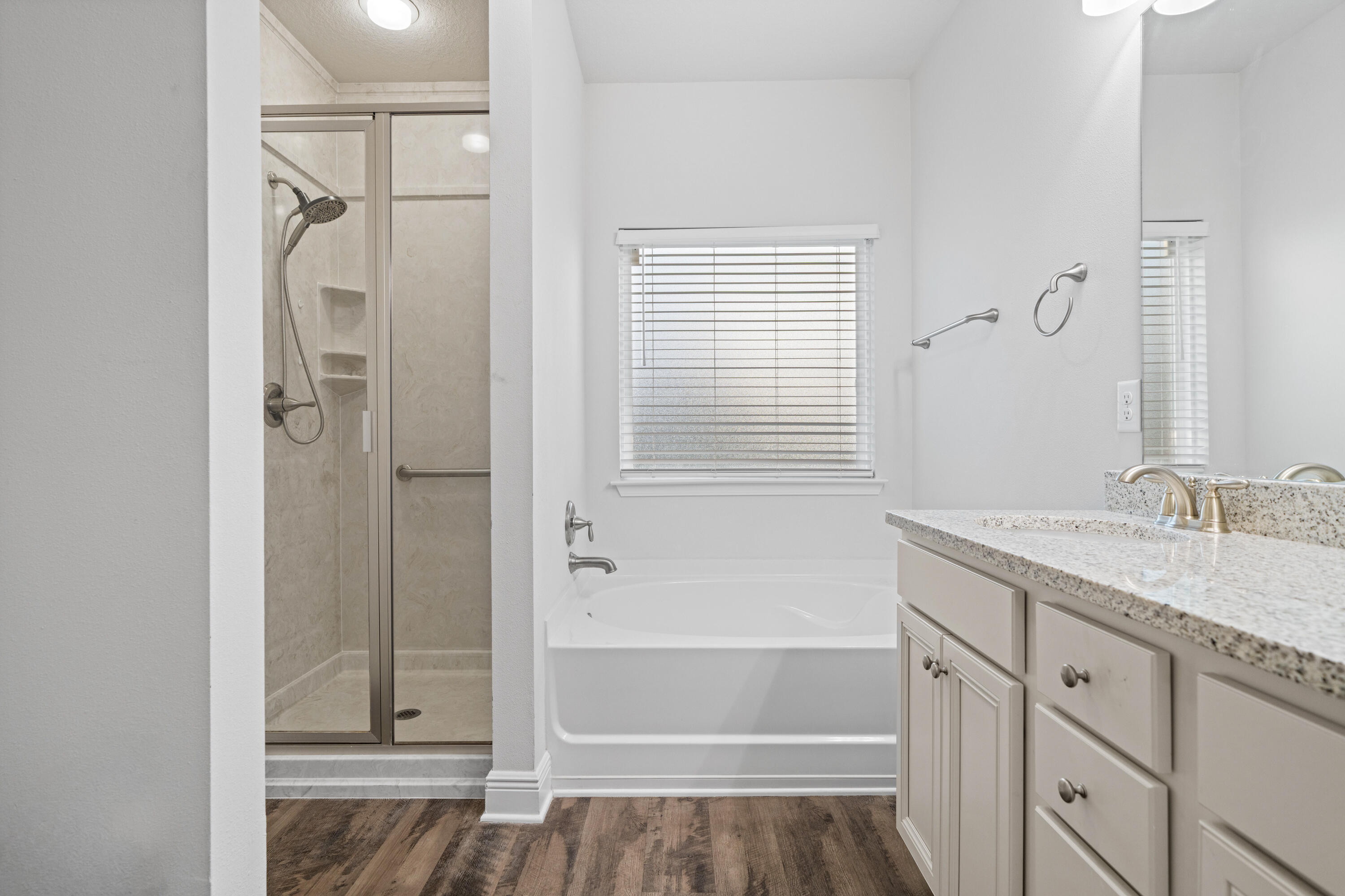 521 Cornelia Street Freeport, FL 32439 - Photo 20 of 39 a bathroom with a granite countertop sink toilet and shower